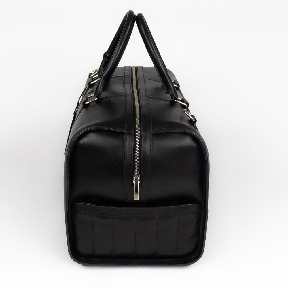 Bagtrainer - New York Duffeltas - Gemaakt uit hoogwaardig volnerfleer in de kleur zwart, met een minimalistisch, functioneel en duurzaam design.