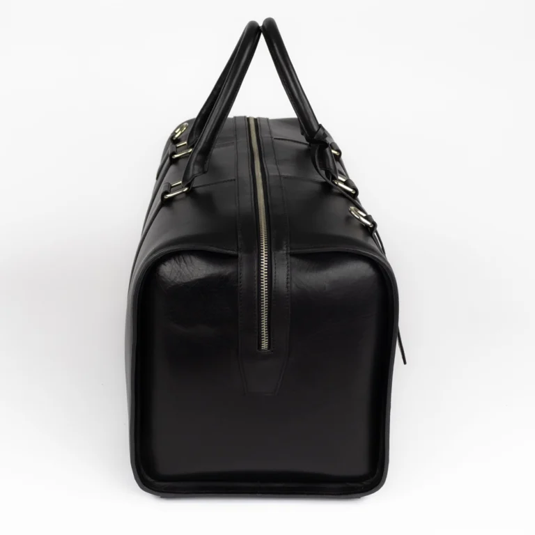 Bagtrainer - New York Duffeltas - Gemaakt uit hoogwaardig volnerfleer in de kleur zwart, met een minimalistisch, functioneel en duurzaam design.